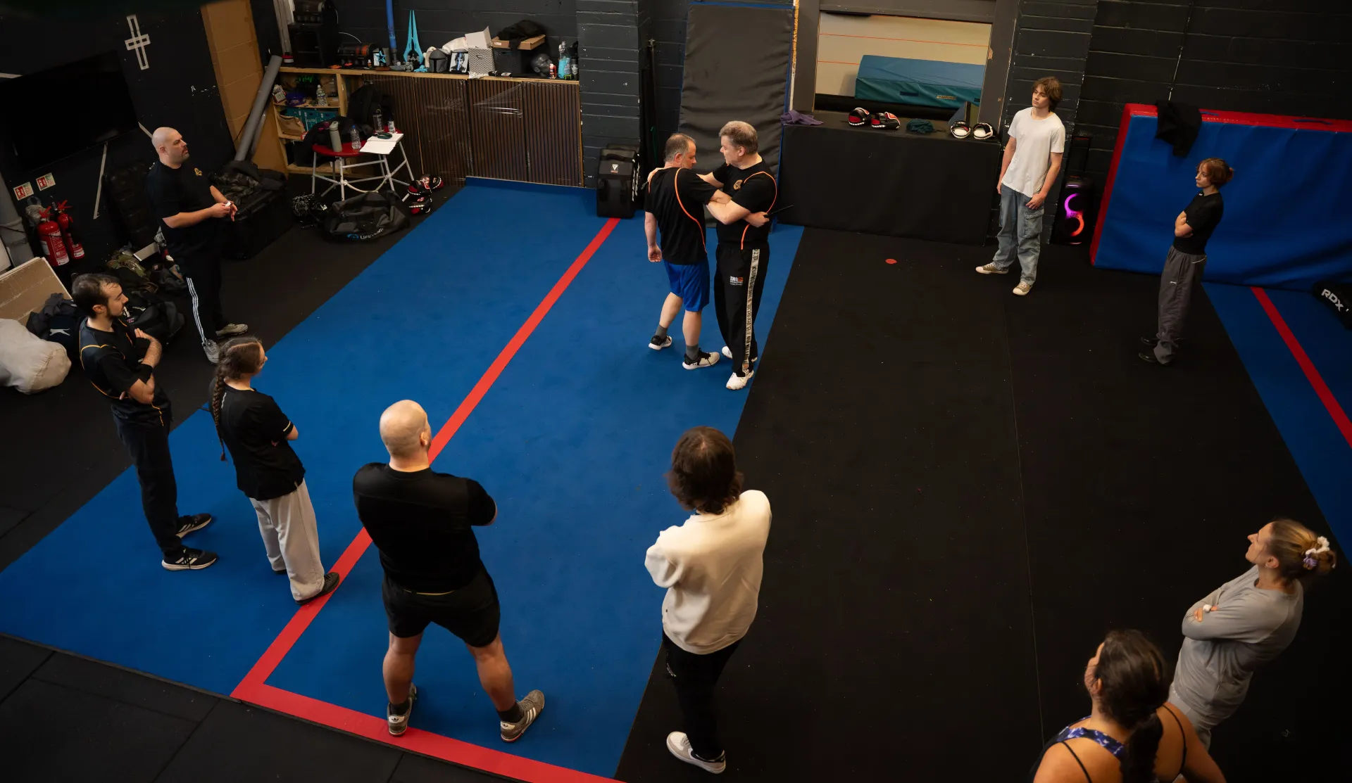 Craig Ridge instructing on the mat